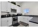 Well-equipped kitchen with stainless steel appliances and a view from the window at 3806 N 23Rd Ave, Phoenix, AZ 85015
