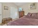 Bedroom with neutral walls, carpeted floor, closet, chest of drawers, and double bed at 40061 W Novak Ln, Maricopa, AZ 85138