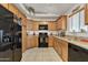 Bright kitchen with updated appliances, granite countertops, and ample cabinet space at 40061 W Novak Ln, Maricopa, AZ 85138