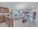 Open kitchen island with granite countertops, perfect for entertaining at 40061 W Novak Ln, Maricopa, AZ 85138