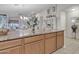 Kitchen island featuring granite countertops offering ample space and beautiful decor at 40061 W Novak Ln, Maricopa, AZ 85138
