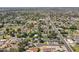 Aerial view featuring residential homes and landscape, showcasing backyard pools and an established neighborhood at 405 E Stanford Ave, Gilbert, AZ 85234