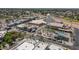 A high-angle shot features Gilbert's water tower and active commercial area with restaurants and retail shops at 405 E Stanford Ave, Gilbert, AZ 85234