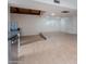 Partially finished basement with light wood grain flooring and good natural light at 405 E Stanford Ave, Gilbert, AZ 85234