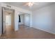 Bright bedroom features wood-look floors and a large sliding-door closet at 405 E Stanford Ave, Gilbert, AZ 85234