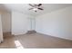 Bright bedroom featuring light wood floors, closet, and good light at 405 E Stanford Ave, Gilbert, AZ 85234