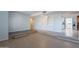 Open-concept living space with built-in shelves and view to the kitchen and fireplace at 405 E Stanford Ave, Gilbert, AZ 85234