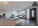 Bright living room boasts fresh paint, natural light, and contemporary decor at 405 E Stanford Ave, Gilbert, AZ 85234