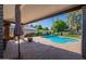 Pool area with covered patio for outdoor entertainment at 405 E Stanford Ave, Gilbert, AZ 85234