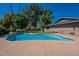 Backyard with swimming pool and view of the home at 405 E Stanford Ave, Gilbert, AZ 85234