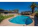 Backyard swimming pool with a covered patio and plenty of room for entertaining at 405 E Stanford Ave, Gilbert, AZ 85234