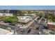 An aerial view of a street featuring restaurants with outdoor seating, crosswalks and retail buildings at 405 E Stanford Ave, Gilbert, AZ 85234