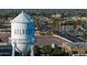 A Gilbert water tower overlooking city streets lined with restaurants and retail establishments at 405 E Stanford Ave, Gilbert, AZ 85234