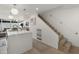 Bright, open-concept space with stairs, island, and contemporary design, seamlessly blending living areas at 4411 N 40Th St # 40, Phoenix, AZ 85018