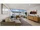 Inviting living room featuring plush seating, large windows, and sleek decor for comfortable, modern living at 4411 N 40Th St # 40, Phoenix, AZ 85018