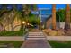 Well-maintained walkway with professional landscaping and ambient lighting at 4411 N 40Th St # 40, Phoenix, AZ 85018
