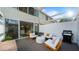 Outdoor patio with modern furniture and a grill, perfect for entertaining and relaxing outside at 4411 N 40Th St # 40, Phoenix, AZ 85018
