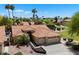 Beautiful desert home featuring a tile roof, three-car garage, and professional desert landscaping at 4625 E Villa Maria Dr, Phoenix, AZ 85032
