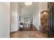 Elegant foyer featuring tile floors, high ceilings, and a decorative stone accent wall at 4625 E Villa Maria Dr, Phoenix, AZ 85032