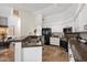 Well-equipped kitchen with granite countertops, stainless steel appliances, and ample cabinet space, perfect for cooking and entertaining at 4625 E Villa Maria Dr, Phoenix, AZ 85032