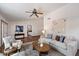 Spacious living room with hardwood floors, neutral tones, and stylish decor creating a relaxing and inviting atmosphere at 4625 E Villa Maria Dr, Phoenix, AZ 85032