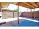 A spacious backyard patio with concrete paving and block wall fencing at 4625 W Thomas Rd # 71, Phoenix, AZ 85031