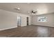 Large bedroom with a ceiling fan, neutral color scheme, and generous space at 4913 E Acoma Dr, Scottsdale, AZ 85254