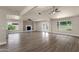 Spacious living room features a fireplace, tile flooring, and lots of natural light at 4913 E Acoma Dr, Scottsdale, AZ 85254