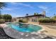 Backyard pool and patio with mature landscaping, fence, and view of the home at 4913 E Acoma Dr, Scottsdale, AZ 85254