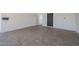 A well lit carport with a large concrete pad and block wall construction at 5336 W Lewis Ave, Phoenix, AZ 85035