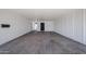Large empty garage with lots of room for storage and/or parking at 5336 W Lewis Ave, Phoenix, AZ 85035