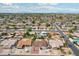 Aerial view of home in a neighborhood featuring mature trees and well-maintained landscaping at 638 W Pantera Ave, Mesa, AZ 85210