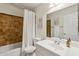 Bathroom featuring a tiled shower/tub, white vanity, and decorative wall art at 638 W Pantera Ave, Mesa, AZ 85210