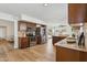 Bright kitchen featuring granite countertops, stainless steel appliances, and wood cabinets at 638 W Pantera Ave, Mesa, AZ 85210