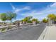 Rock Springs gated community entrance featuring stone pillars and landscaping at 7634 W Redbird Rd, Peoria, AZ 85383