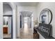 Bright hallway with tile floors, recessed lighting, and decorative accents at 7634 W Redbird Rd, Peoria, AZ 85383