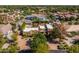 Daytime aerial view of a residential property showing its mature landscaping at 8675 S College Ln, Tempe, AZ 85284