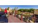 Spacious balcony with seating provides stunning views of a swimming pool and lush backyard at 8675 S College Ln, Tempe, AZ 85284