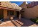 Relaxing courtyard featuring stylish outdoor seating, a fountain, and decorative architectural details at 8675 S College Ln, Tempe, AZ 85284