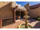 Picturesque courtyard with a classic fountain, covered patio with seating, and decorative accents at 8675 S College Ln, Tempe, AZ 85284