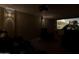 A home theater with large screen, projector, and black leather reclining chairs for comfortable movie viewing at 8675 S College Ln, Tempe, AZ 85284