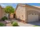 Charming single-story home featuring a well-maintained yard, desert landscaping, and an attached two-car garage at 8839 W Rimrock Dr, Peoria, AZ 85382
