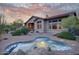 Beautiful backyard featuring a private spa with desert landscaping and a covered patio area at 9715 E Allison Way, Scottsdale, AZ 85262