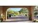 Covered entry with stone pavers and desert landscape view at 9715 E Allison Way, Scottsdale, AZ 85262