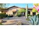 Charming exterior with a desert landscape, featuring a saguaro cactus and native plants at 9715 E Allison Way, Scottsdale, AZ 85262