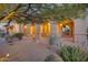 Attractive home exterior with archway and desert landscaping at 9715 E Allison Way, Scottsdale, AZ 85262