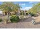 Landscaped front yard featuring desert flora, enhancing curb appeal at 9715 E Allison Way, Scottsdale, AZ 85262