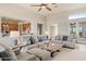 Cozy living room with comfortable sofas and a view into the kitchen at 9715 E Allison Way, Scottsdale, AZ 85262