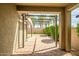 Covered back patio with a brick surface at 9829 E Talon Ave, Mesa, AZ 85212