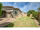Backyard featuring small grassy yard at 9829 E Talon Ave, Mesa, AZ 85212